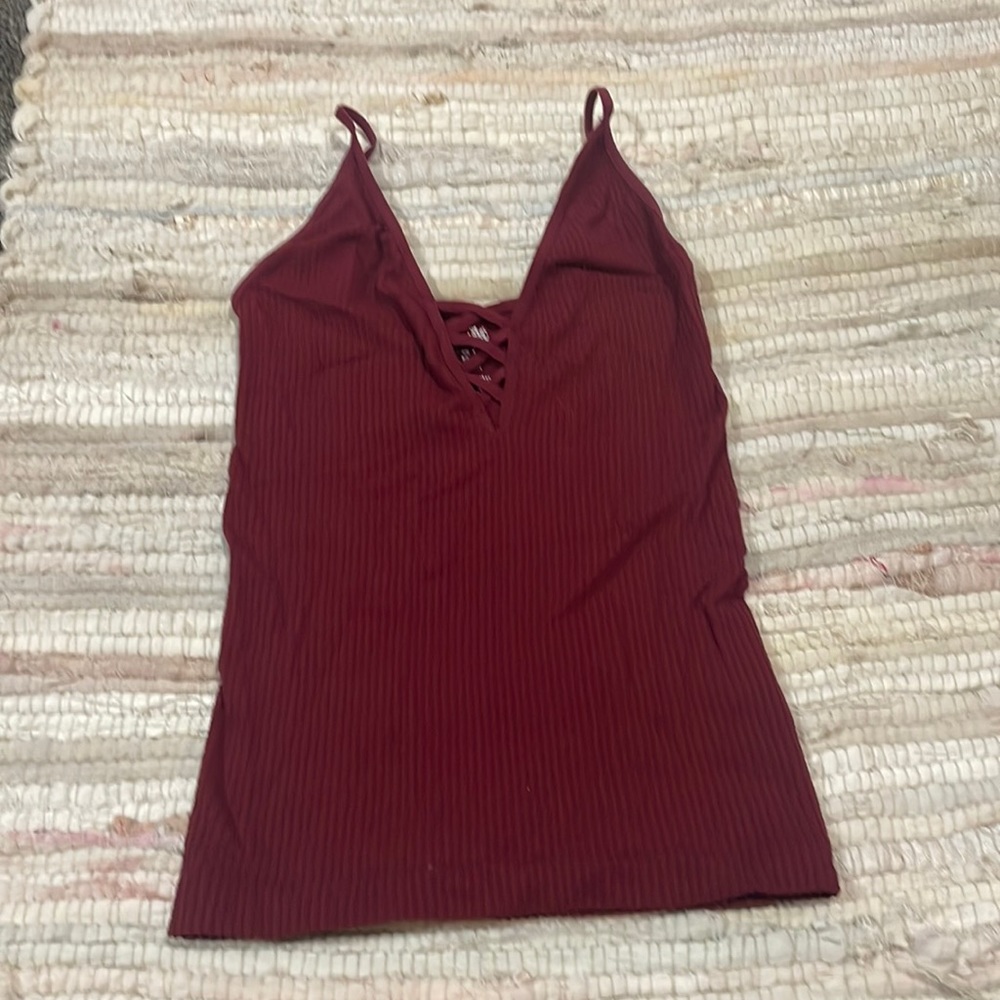 Dark red tank top.